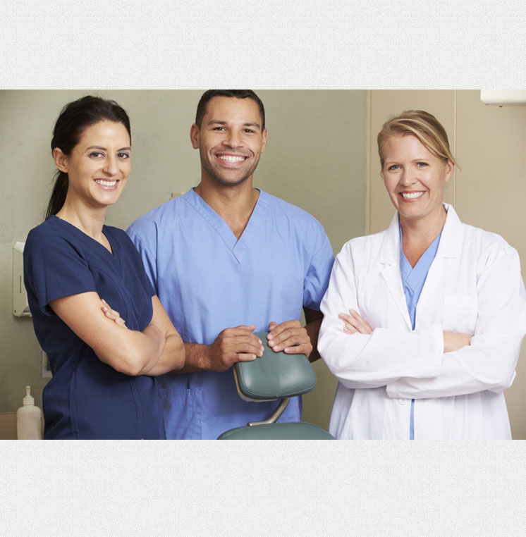 Portrait Of Dentist And Dental